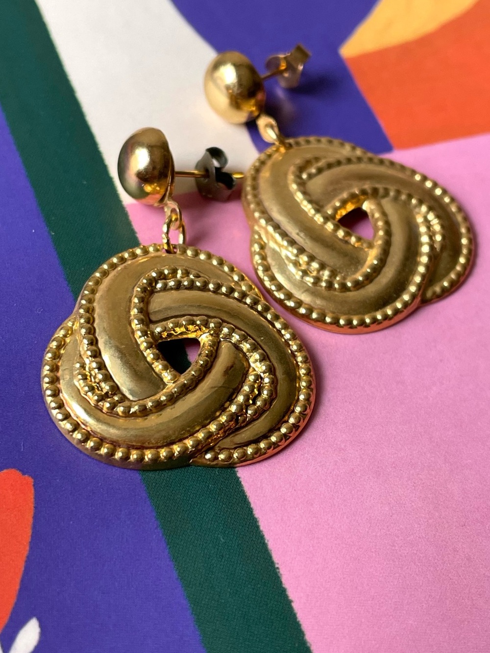 Vintage goldtone dangling knot pierced earrings